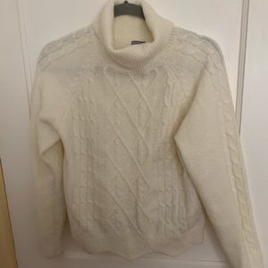White turtleneck sweater